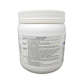 Tempo WP Ultra powder being dusted on outdoor turf for broad-spectrum insect control.