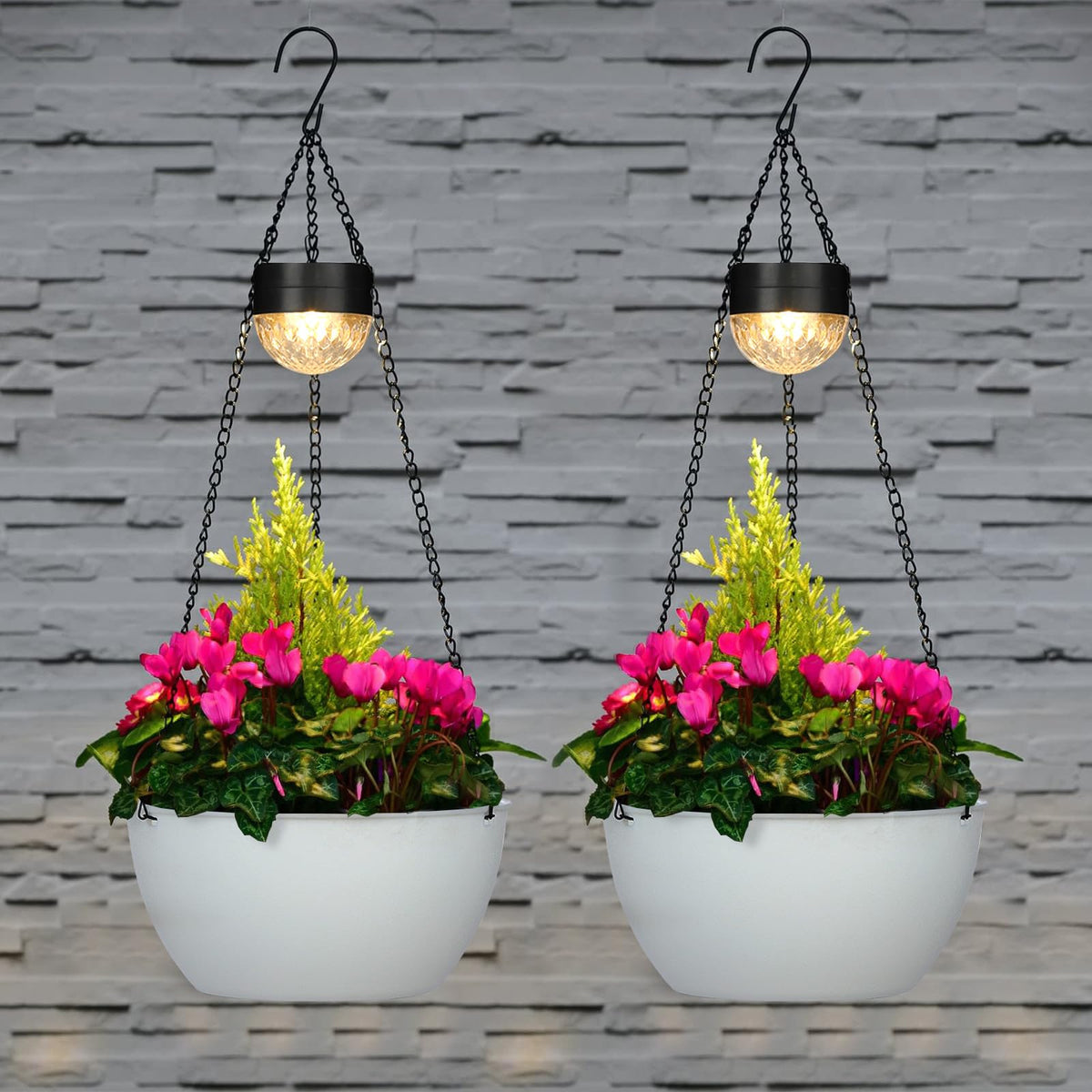 Bayn solar light adds a warm glow at dusk to enhance garden ambience.