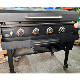 Rust-resistant padded frame provides durable support for outdoor cooking