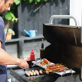 BBQtopia warming rack in use provides extra warm space for cooked items