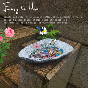 BBRGIRL Butterfly Feeder in natural hues blend with garden decor