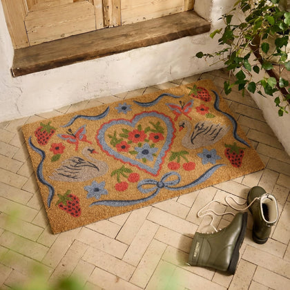BBSET artificial coir swan welcome mat with bow and floral design traps dirt.