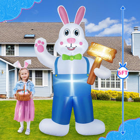 B&D Easter inflatable bunny at night with LED glow enhances porch ambience.