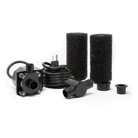 Beckett DP900 submersible pump submerged in a pond powering a cascading waterfall.