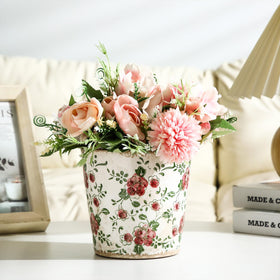 Beeveer ice-glazed green floral planter showcases decorative detail on countertops or shelves.
