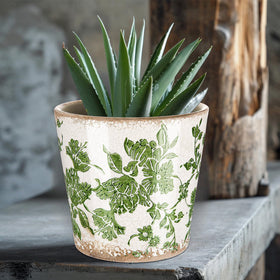Beeveer ice glazed green floral pattern adds vintage charm to windowsills.