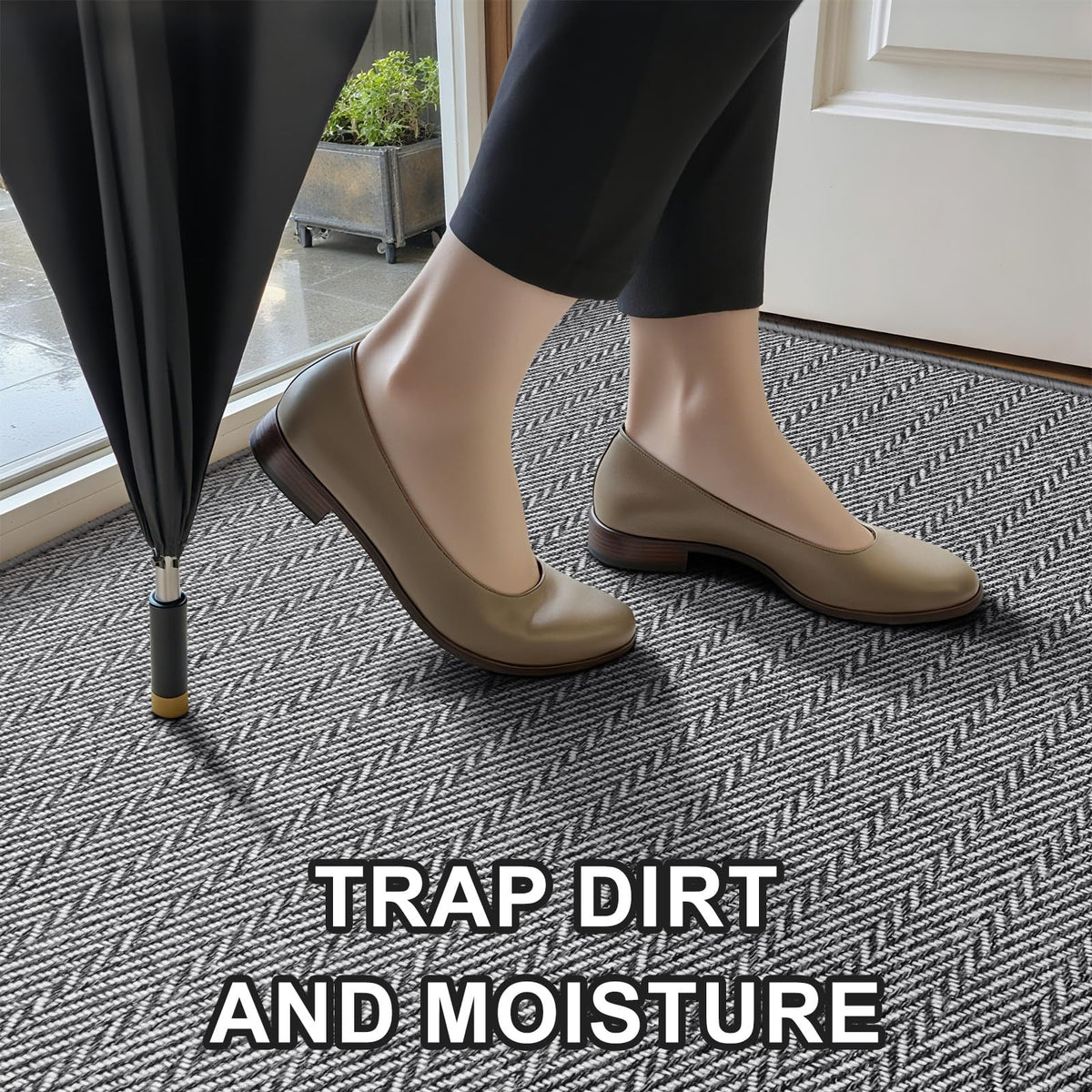 BEISIFLOOR 24x36 grey door mat demonstrates moisture and dirt absorption.