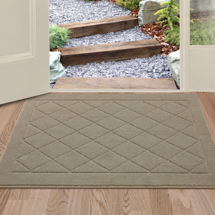 BEQHAUSE Dirt Trapper mat at the front door traps dirt and moisture for a cleaner entry.
