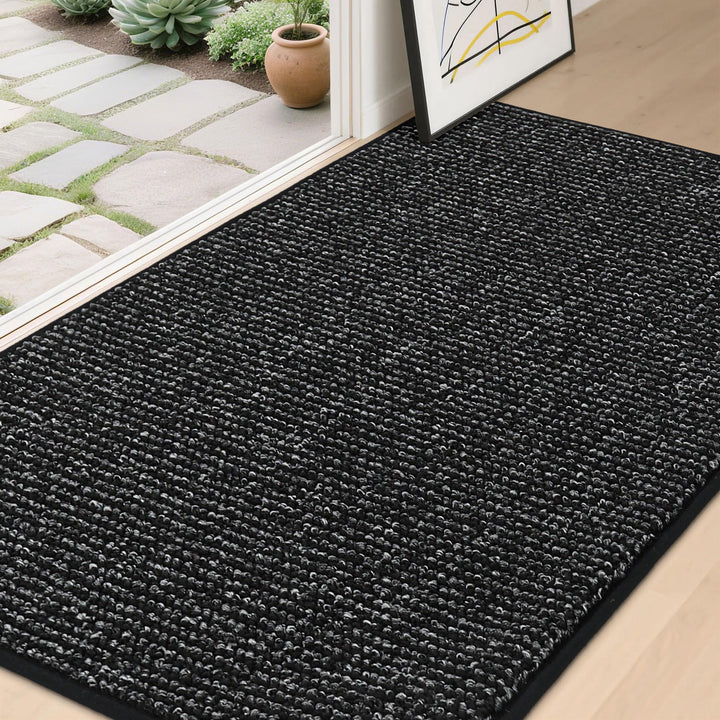 BEQHAUSE Dirt Trapper front door mat absorbs moisture to welcome guests