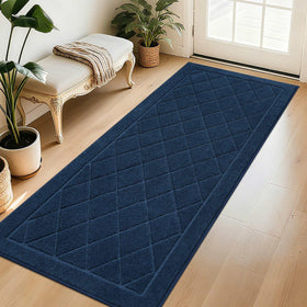 BEQHAUSE Dirt Trapper front door mat captures dirt and moisture.
