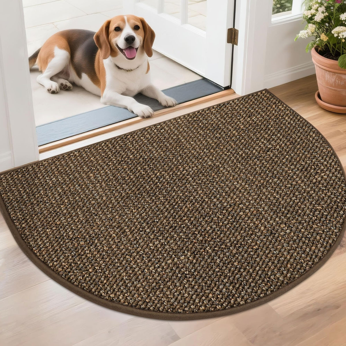 BEQHAUSE Dirt Trapper half-moon doormat at the front door traps dirt and moisture.