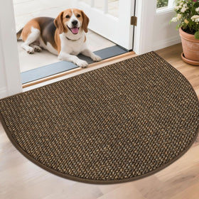 BEQHAUSE Dirt Trapper half-moon doormat at the front door traps dirt and moisture.