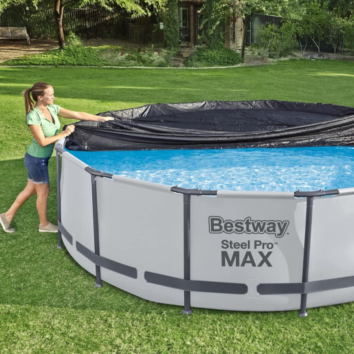 Bestway Flowclear PVC round pool cover with drain holes prevents water buildup