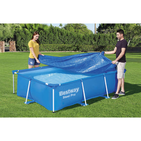 Bestway FlowClear cover reducing evaporation on an outdoor rectangular pool