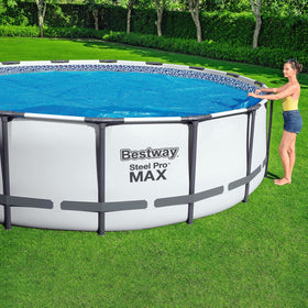 Bestway FlowClear cover floats on pool, creating greenhouse-like warmth.