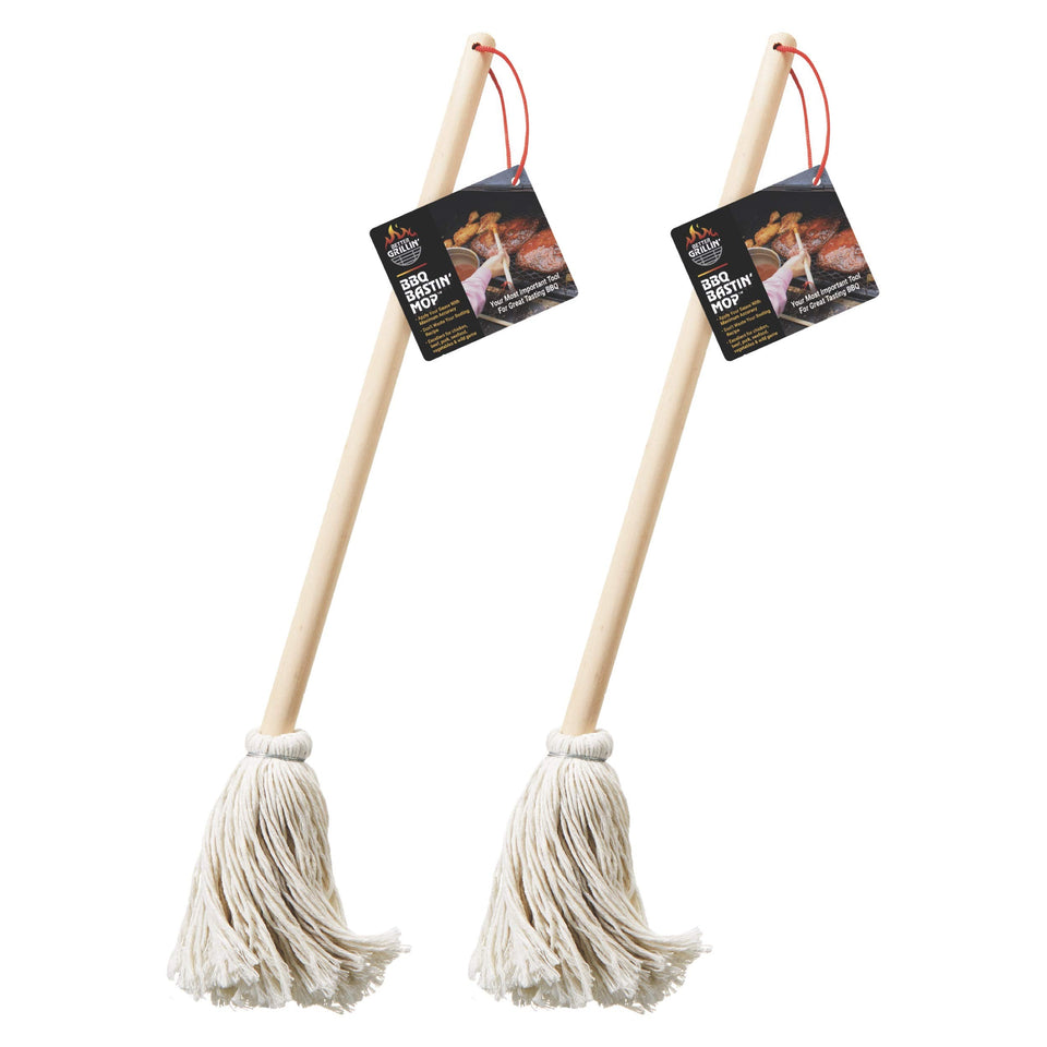 Better Grillin Bastin Mop covering meat with sauce for even grilling.