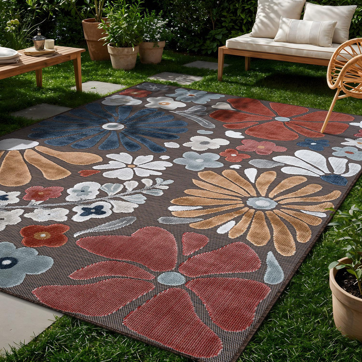Beverly Rug beach deck floral design resists sun and dirt outdoors.