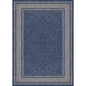 Beverly Rug border detail 9x12 navy shows crisp edging defining outdoor seating