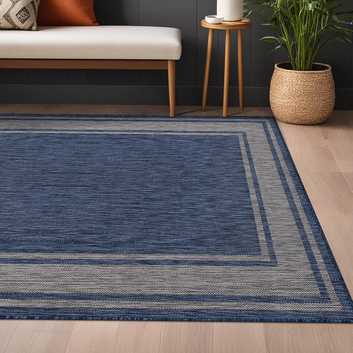 Beverly Rug dining area under table 9x12 navy provides soft, safe footing