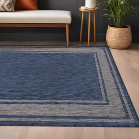 Beverly Rug dining area under table 9x12 navy provides soft, safe footing