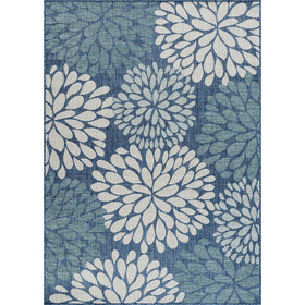 Beverly Rug modern exotic tropical leaf design enhances patios with vibrant color.