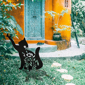 Laser-cut metal cat decor creates lifelike garden scene