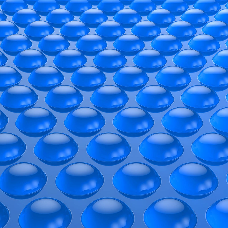BigXwell solar pool cover in blue 16 mil covering a 20x40 ft in-ground pool for warmed swims