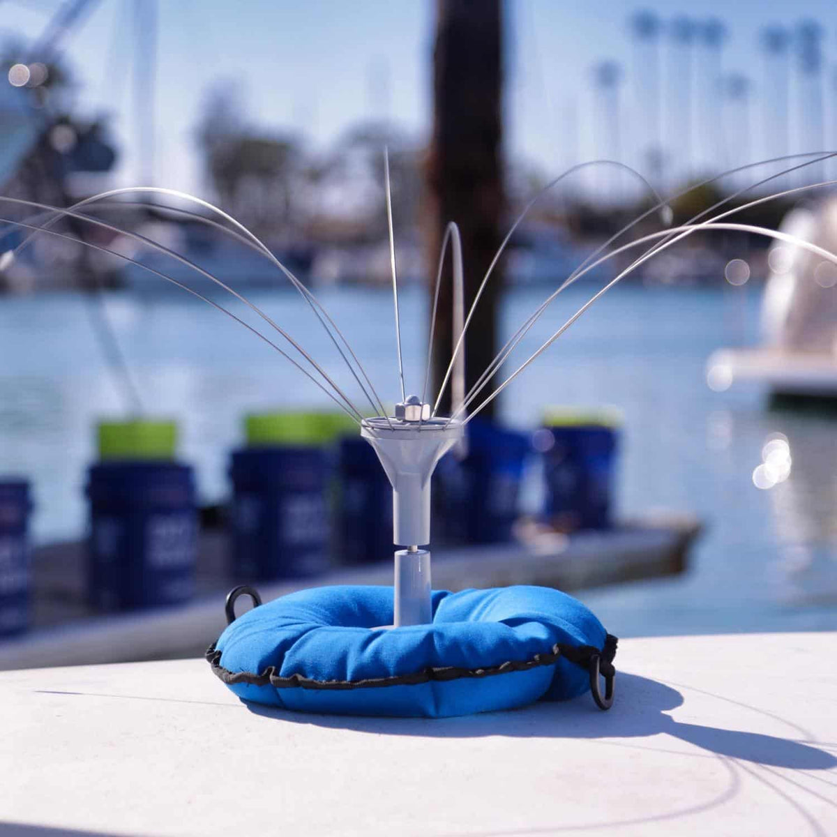 Bird B Gone sand base includes hardware for quick installation