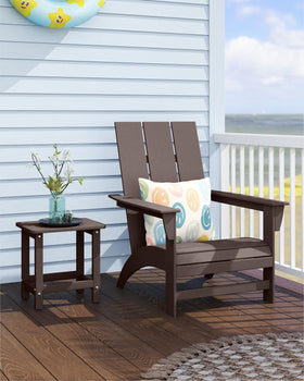 Adjustable feet pads on BIVODA side table stabilizing on uneven ground