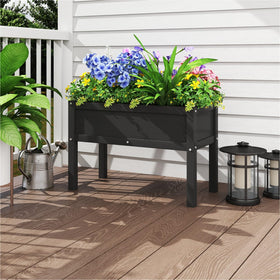 BIVODA outdoor elevated planter on a patio ready for use.