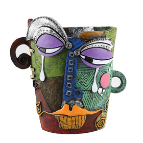 BJVF Picasso-Inspired abstract face pot adds vibrant color to indoor spaces.