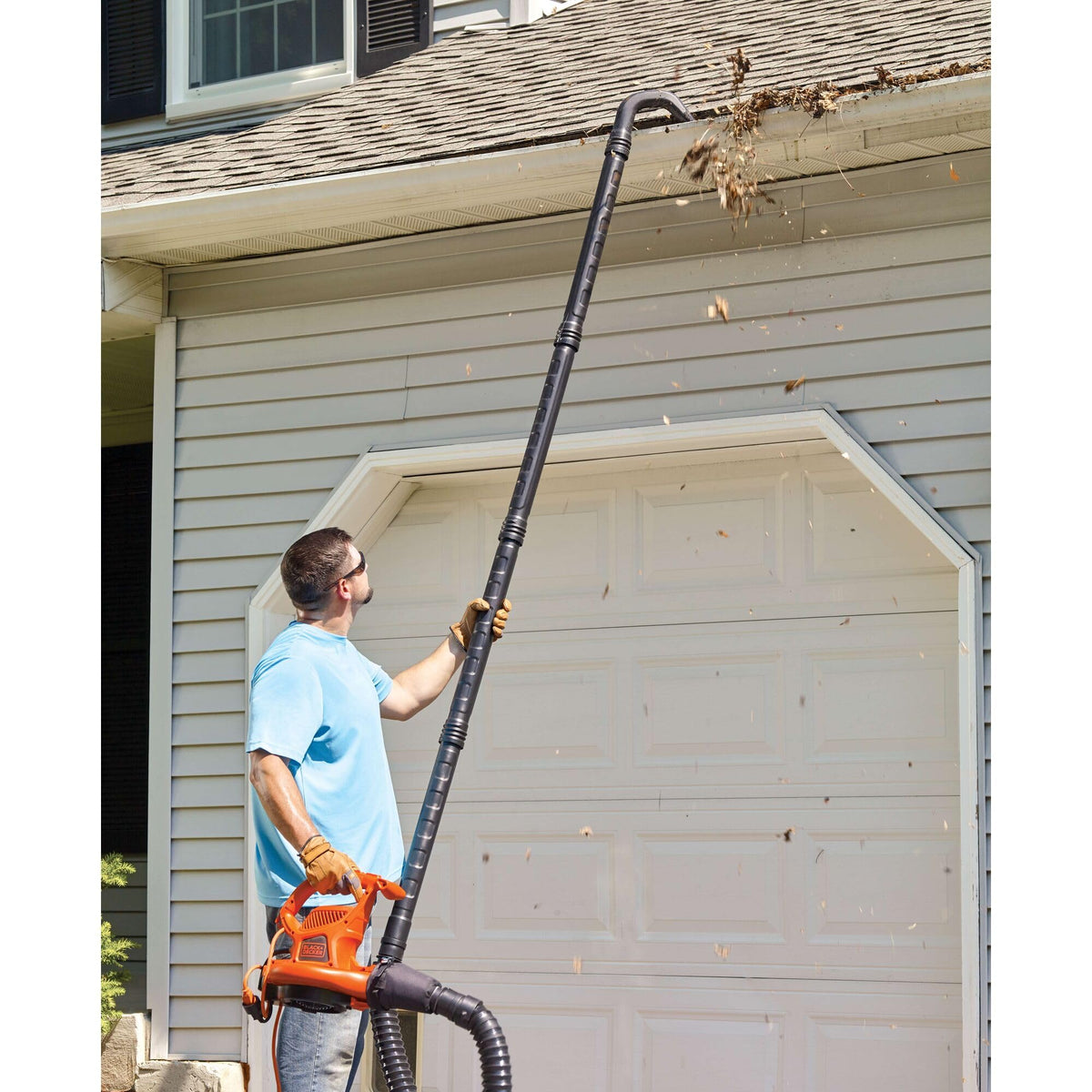 Flexible BLACK+DECKER gutter cleaner tube improves maneuverability from the ground