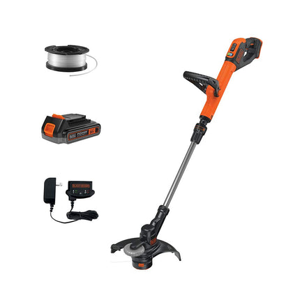 Black Decker Beyond LST522E1AEV trimmer in action trimming along lawn edge