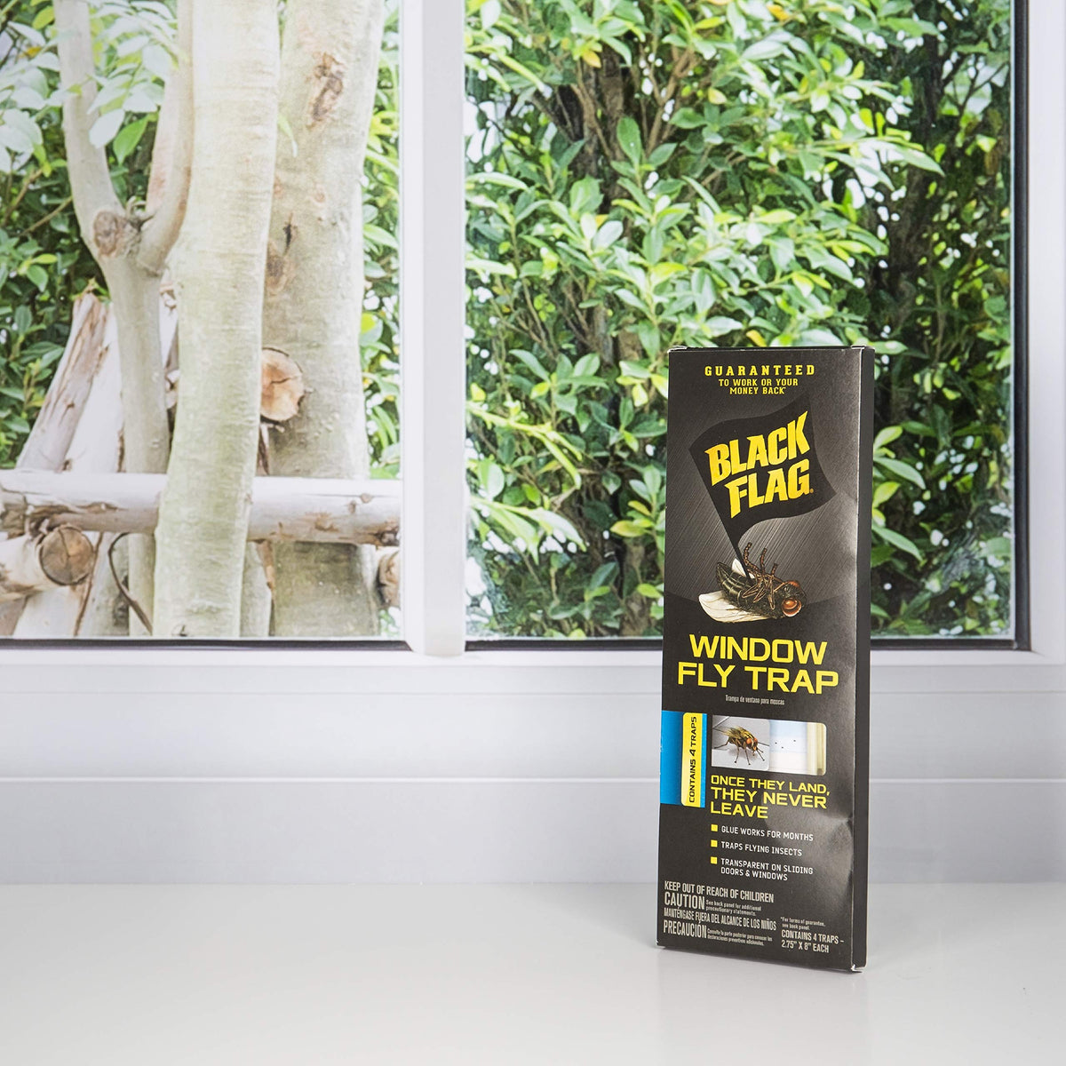 Black Flag Window Fly Trap during installation on a door keeps entries tidy