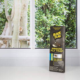 Black Flag Window Fly Trap during installation on a door keeps entries tidy