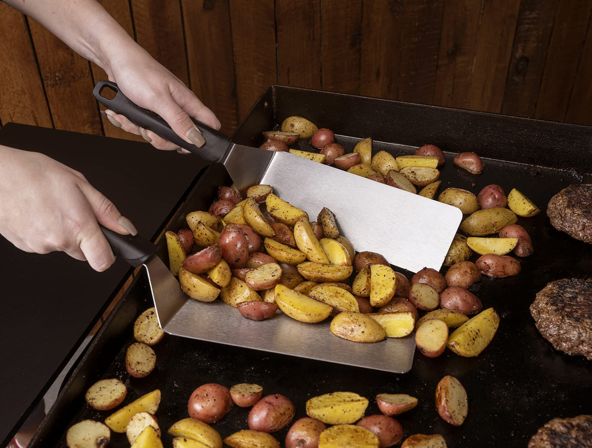 BLACKSTONE 5-piece griddle kit laid out for efficient cooking