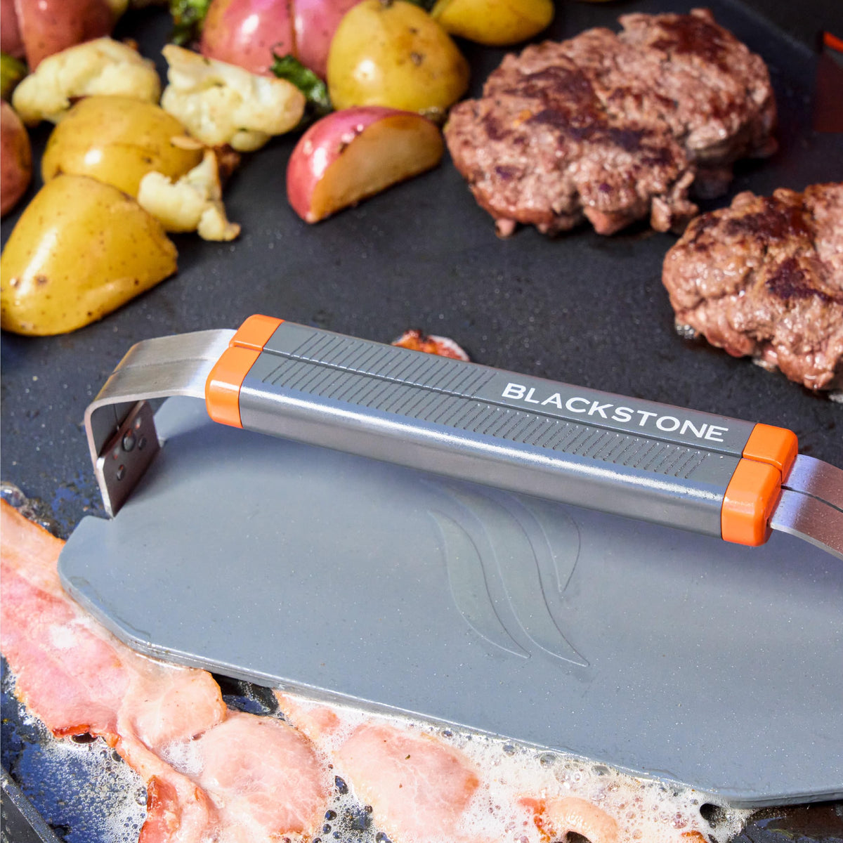Blackstone 5987 OTG collapsible griddle press dishwasher safe for easy cleanup.