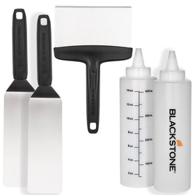 BLACKSTONE hamburger spatula on a hot griddle for easy flipping