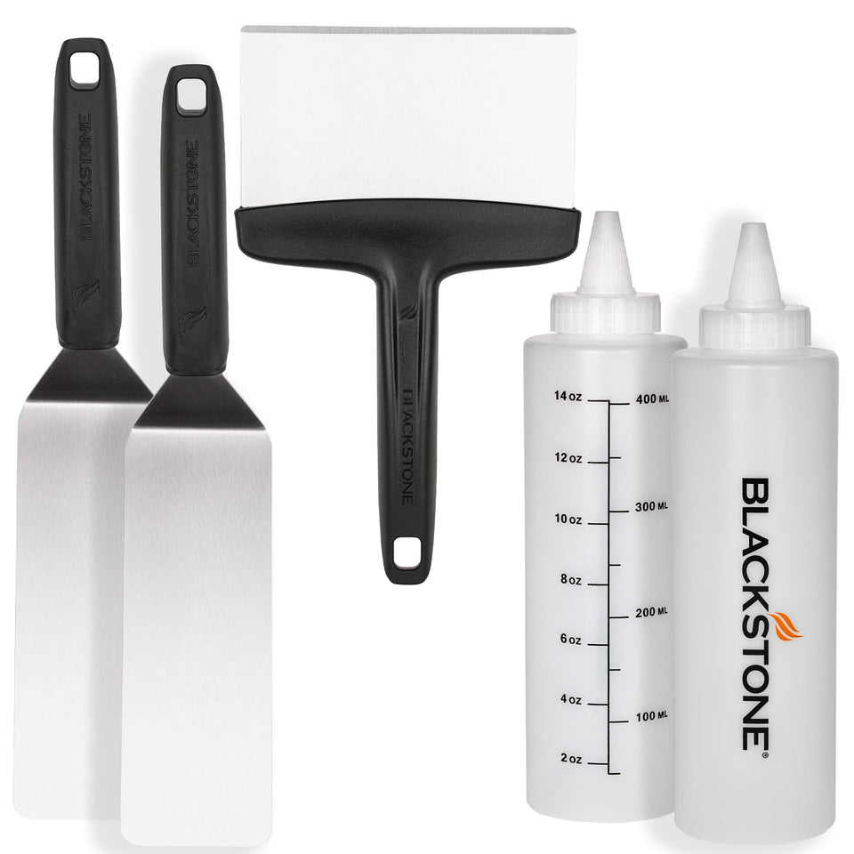 BLACKSTONE hamburger spatula on a hot griddle for easy flipping