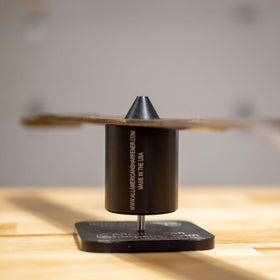 Anodized aluminum balancer with stainless steel components for durable performance.
