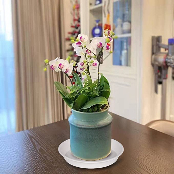 Bleuhome 10-inch gray plant saucer stacked for storage.