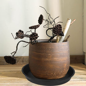 Bleuhome four-pack 19-inch plant saucers for versatile home placement.
