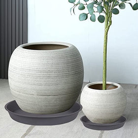 Bleuhome round 10in plant tray fits pots cleanly, preventing spills.