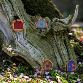 BLLREMIPSUR multi colored fairy doors brighten fences and walls in tiny garden scenes
