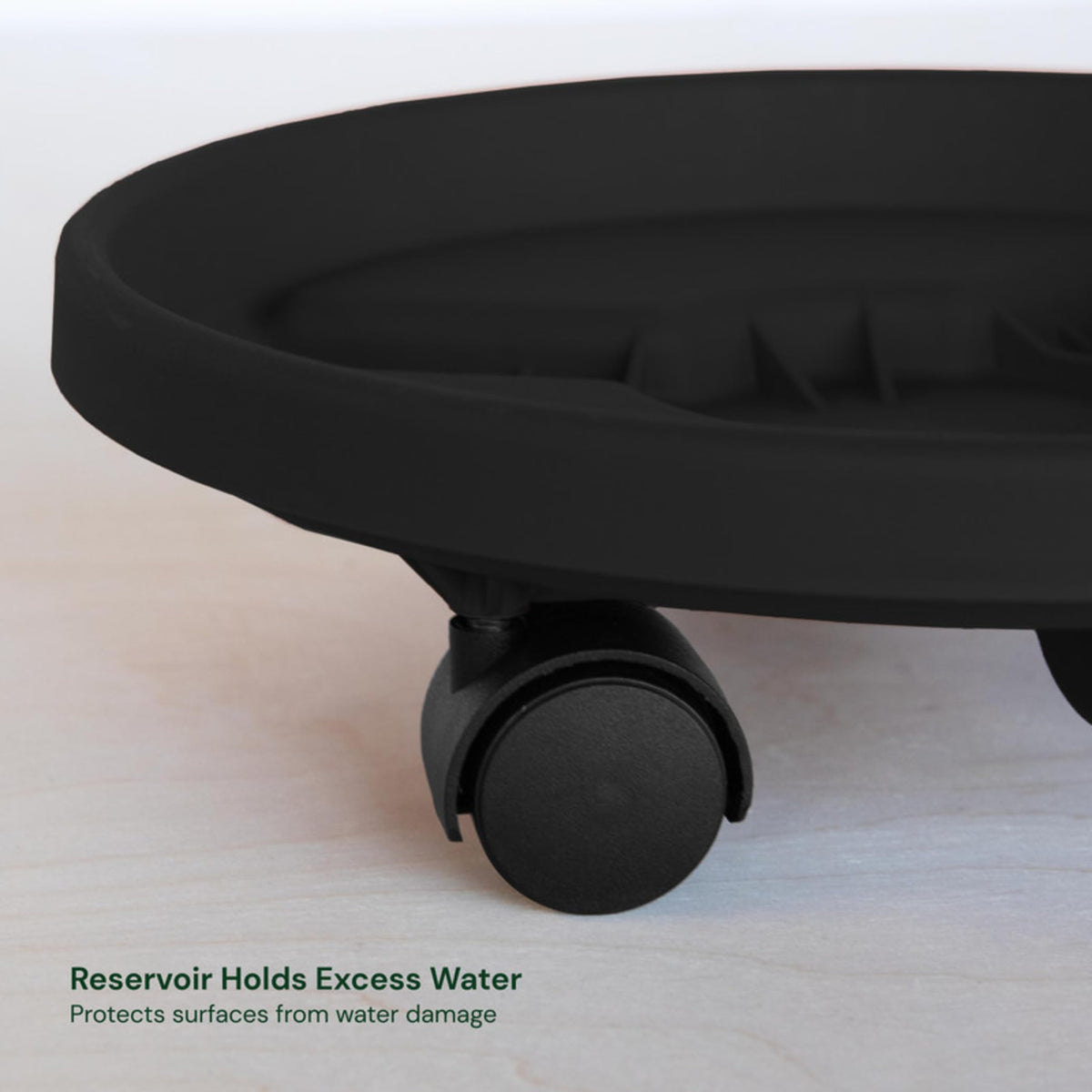 Bloem planter dolly with swivel wheels moves heavy pots safely