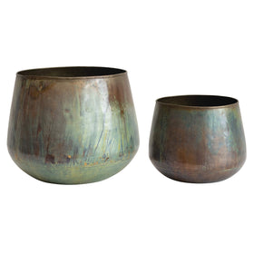 Bloomingville oxidized green planter pair adds vintage charm to flowers and herbs.
