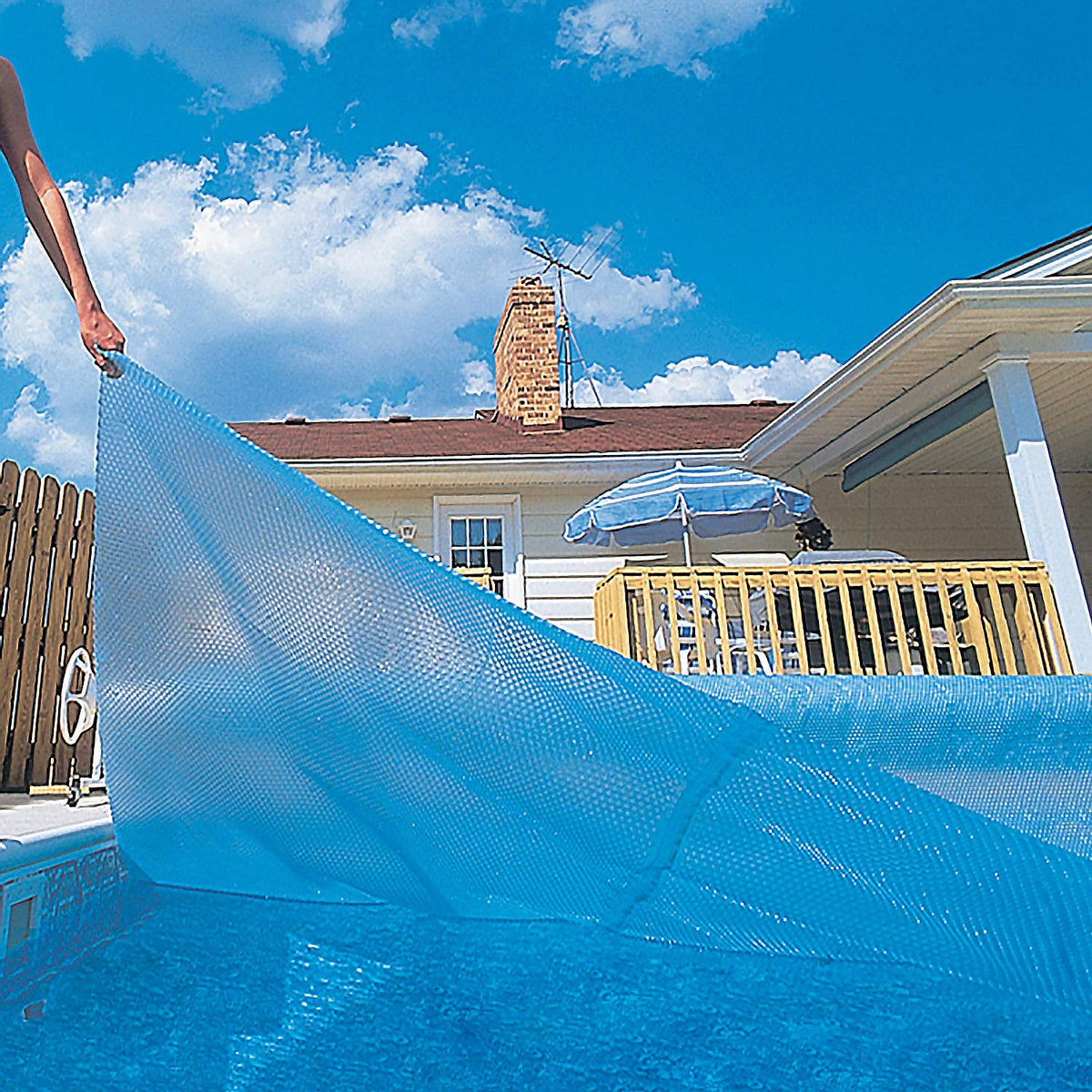 Blue Wave 12mil blanket demonstrating heat retention for in-ground pool