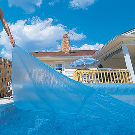Blue Wave 12mil blanket demonstrating heat retention for in-ground pool