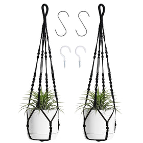 BlueMake macrame plant hanger with wood beads in black holding a pot