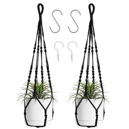 BlueMake macrame plant hanger with wood beads in black holding a pot